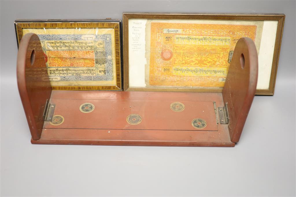 A group of Chinese and Japanese objects, 19th/20th century, including an inscribed ink box an inkstone, a lacquer bookslide, two Tibeta